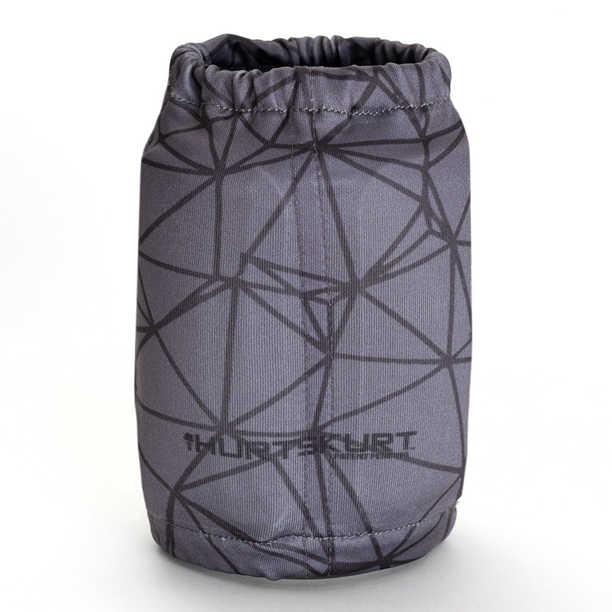 A HurtSkurt dark grey geometric patterned small ice pack for hand and wrist pain relief.
