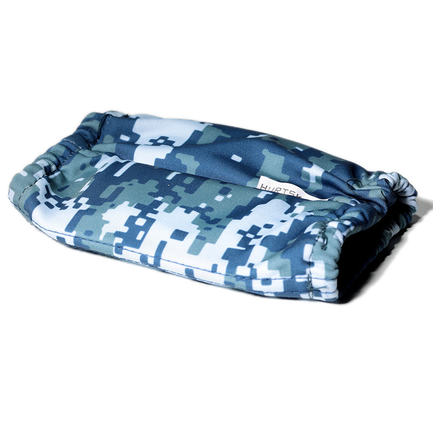 A HurtSkurt blue camoflage patterned small ice pack for hand and wrist pain relief.