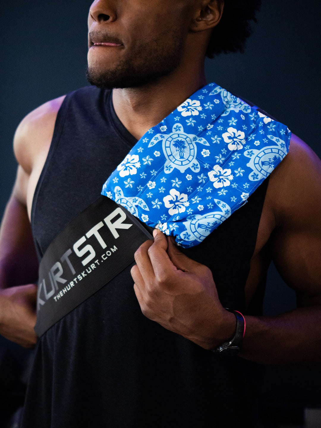 Man wearing a Large HurtSkurt® on his shoulder with a SkurtStrap holding it in place