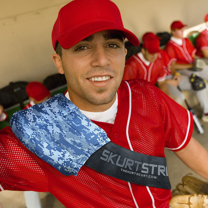 Baseball player wearing a Large HurtSkurt® over the shoulder with a SkurtStrap™ holding it in place