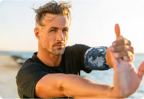 Man stretching wearing Medium Seal Team HurtSkurt